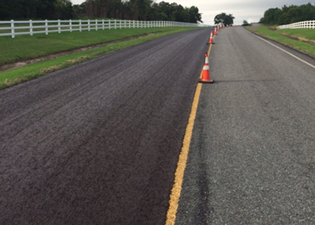 Micro surfacing treatment applied to half of Village Road